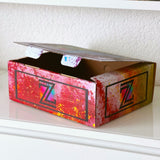 NUR Box im Zeilenspringer-Design
